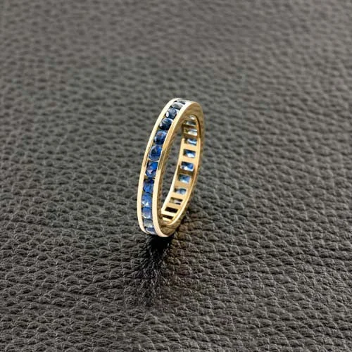 Women’s luxury wedding rings-Channel set Sapphire Eternity Band