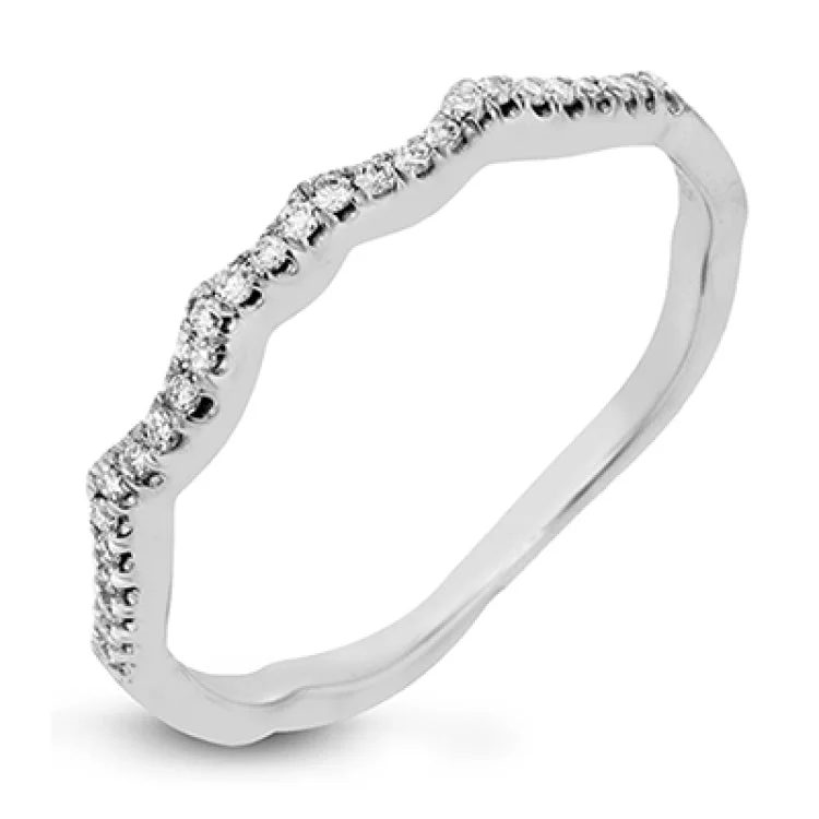 Women's vintage halo engagement rings-This impressive contemporary white engagement ring features a unique twisting design on the shank, which is complemented by .17 ctw of round cut white diamonds.