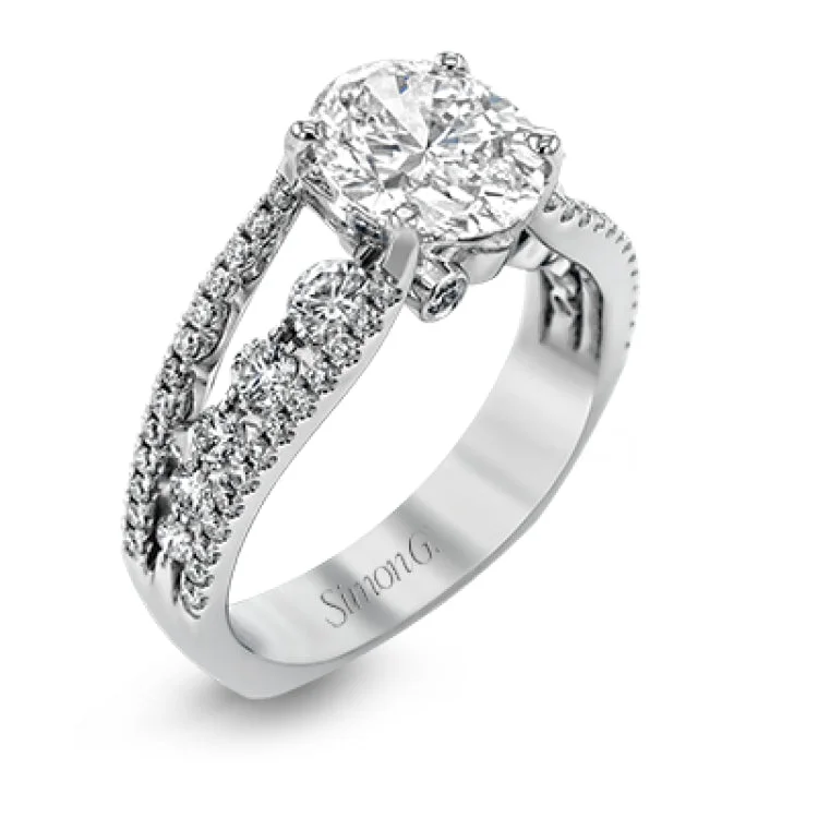 Women's platinum solitaire engagement rings-The lovely vintage style of this white gold engagement ring is further enhanced by .91 ctw of shimmering round cut diamonds.