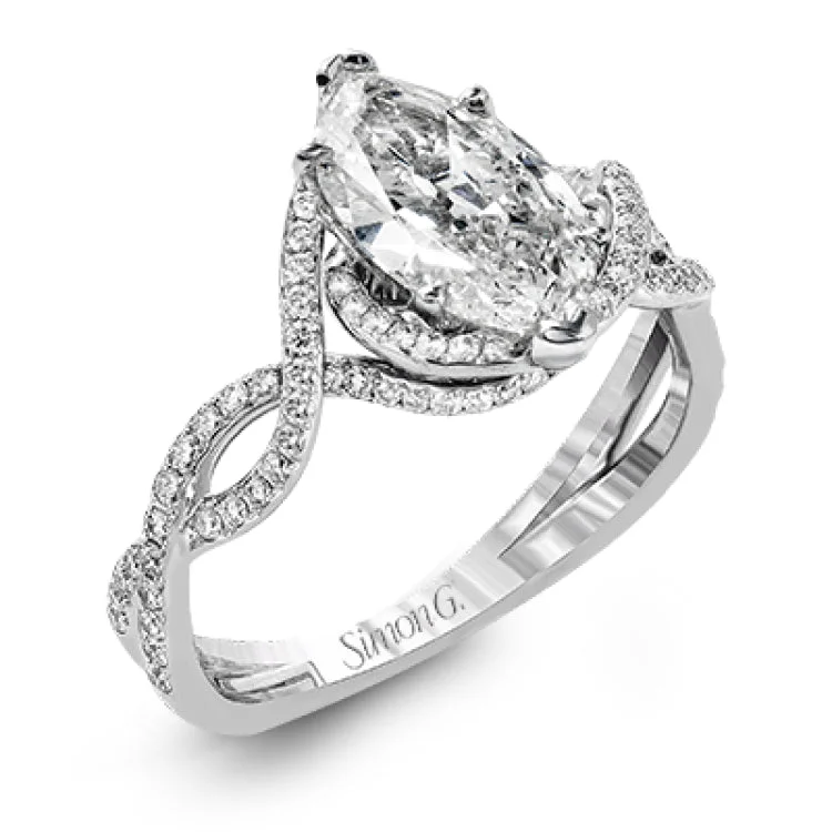 Women's antique-inspired engagement rings-Classic with a modern twist, this white gold engagement ring features .50 ctw of sparkling white diamonds in a dramatic openwork design.