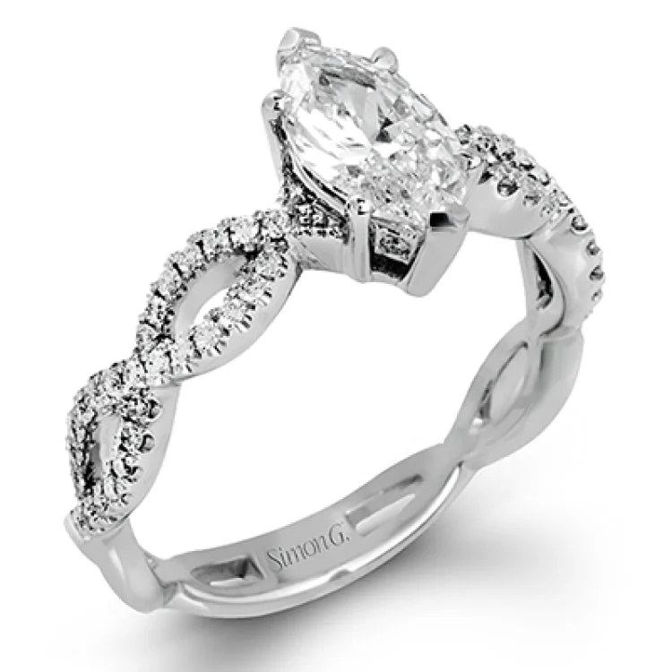 Women's minimalist engagement rings-The intricate twisted design of this modern white gold engagement ring and wedding band set is set with .65 ctw of striking round cut white diamonds.