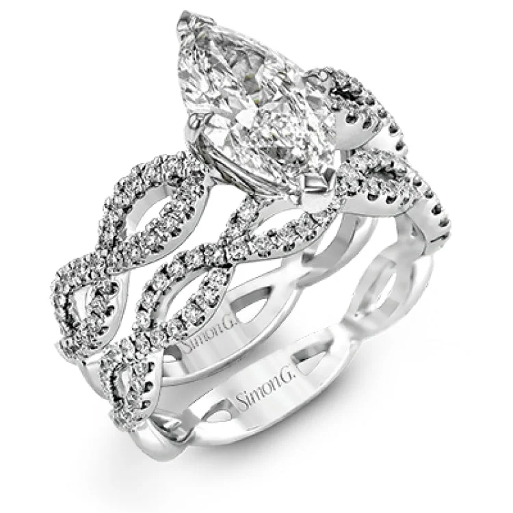 Women's round engagement rings with diamonds-The intricate twisted design of this modern white gold engagement ring and wedding band set is set with .65 ctw of striking round cut white diamonds.