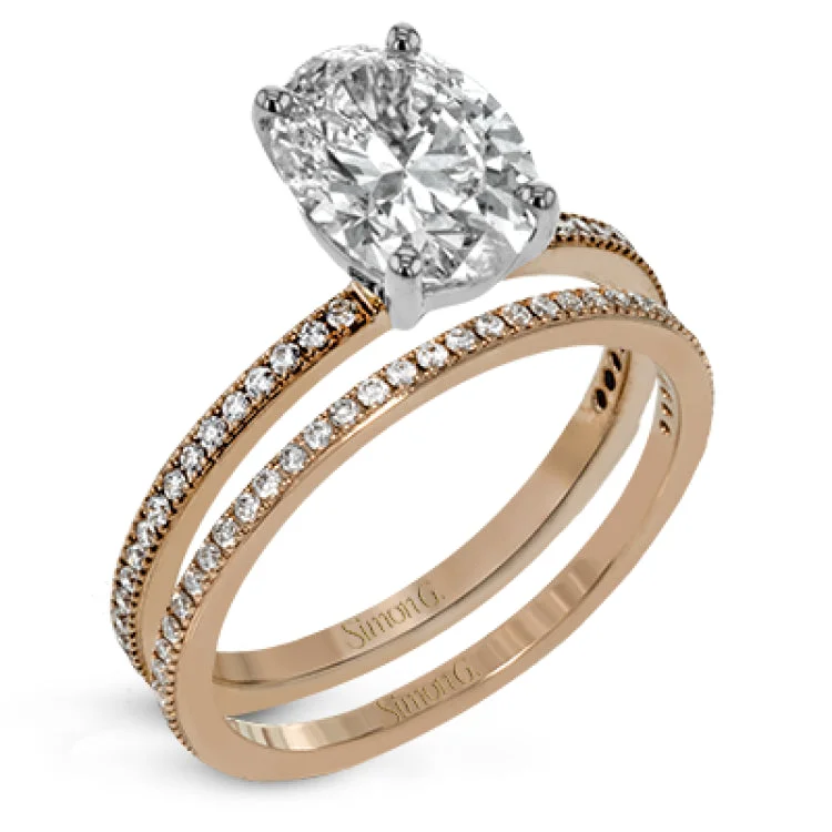 Women's marquise-cut engagement rings-The classic, streamlined design of this 18k rose gold wedding set is accented by .30 ctw of sparkling white round brilliant diamonds.