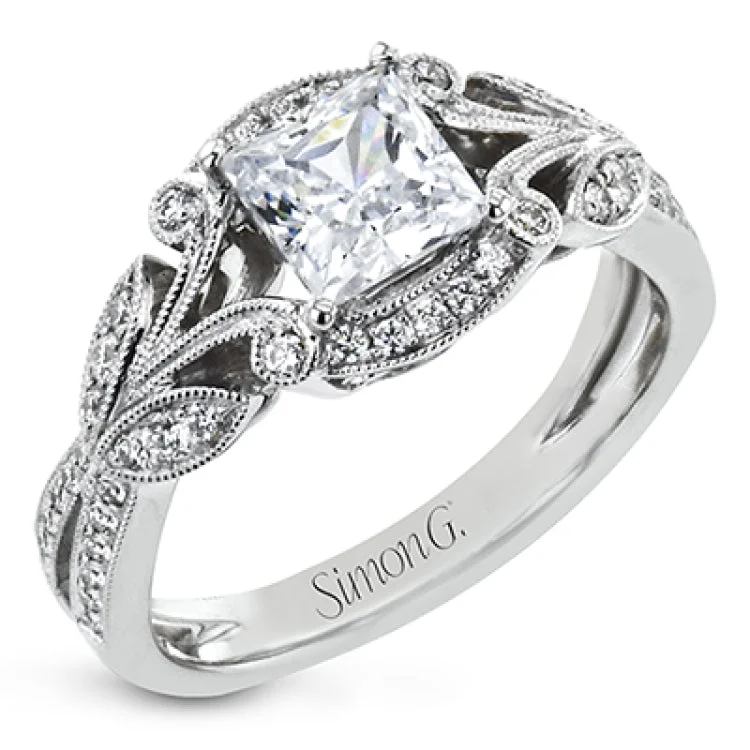 Women's pink diamond engagement rings-This amazing 18k white gold engagement ring features vintage-inspired design elements set with .28 ctw of white diamonds.