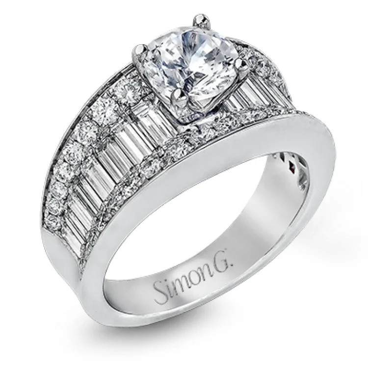 Women's platinum engagement rings-This eye-catching contemporary white gold engagement ring is accented by .75 ctw round cut white diamonds and 1.26 ctw baguette white diamonds for an unforgettable look.