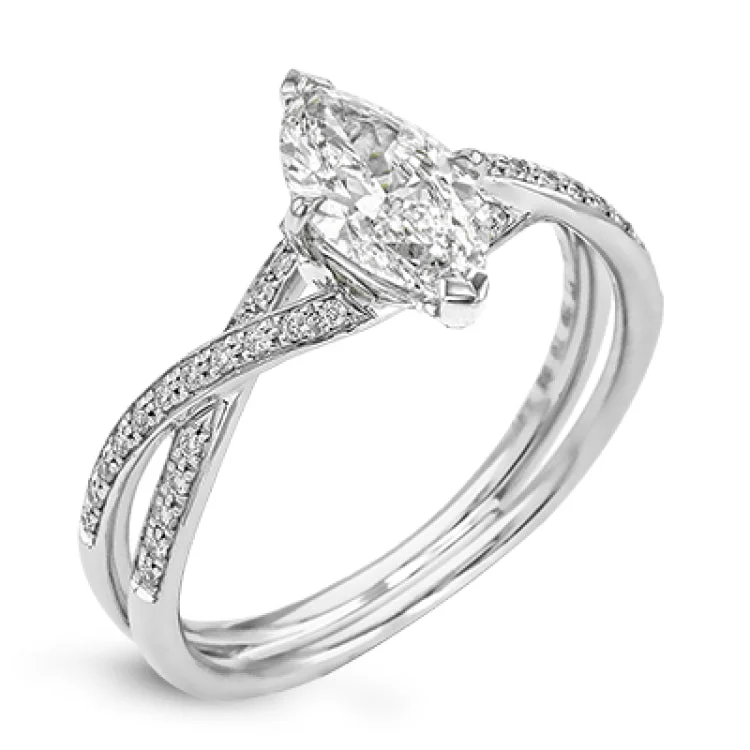 Women's oval diamond engagement rings-This sparkling modern white gold engagement ring and wedding band set features an eye-catching twisted design accented by .22 ctw of shimmering round cut white diamonds.