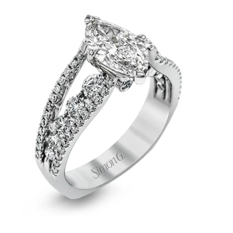 Women's affordable engagement rings-The lovely vintage style of this white gold engagement ring is further enhanced by .91 ctw of shimmering round cut diamonds.