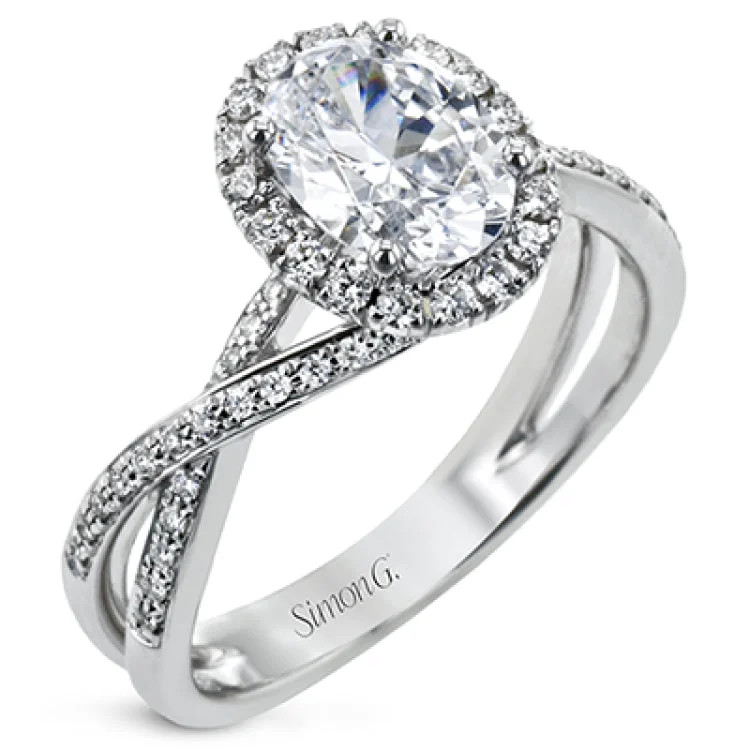 Women's custom design engagement rings-This sparkling modern engagement ring features an eye-catching twisted design with elegant classic halo accented by .29 ctw of shimmering round cut white diamonds.