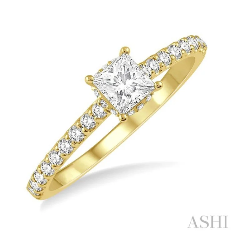 Women's engagement rings with baguette diamonds-1/2 ctw Round Cut Diamond Engagement Ring With 1/4 ct Princess Cut Center Stone in 14K Yellow Gold