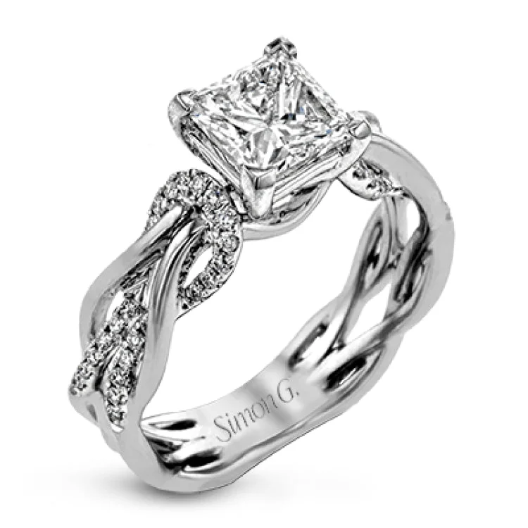 Women's pink diamond engagement rings-This impressive contemporary white engagement ring features a unique twisting design on the shank, which is complemented by .17 ctw of round cut white diamonds.