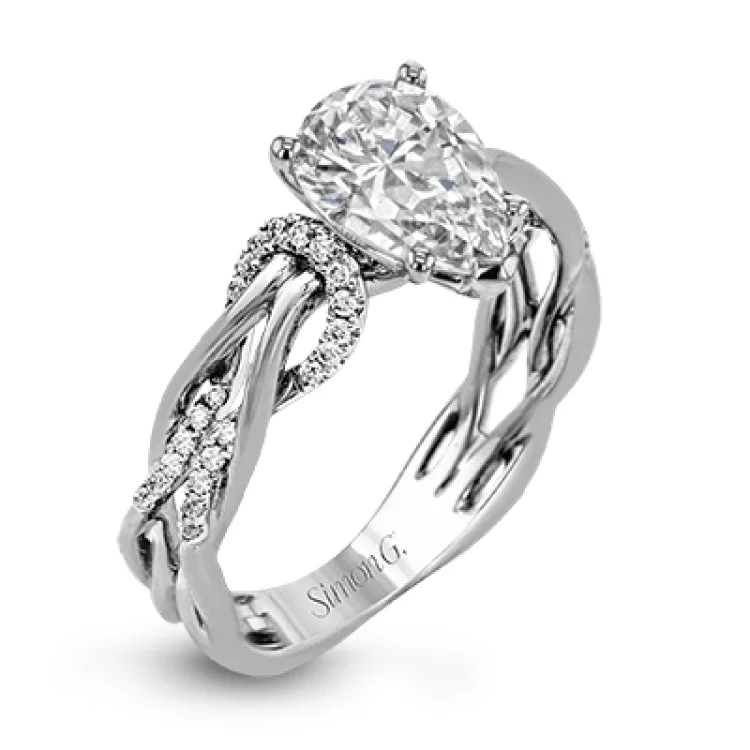 Women's halo diamond engagement rings-This impressive contemporary white engagement ring features a unique twisting design on the shank, which is complemented by .17 ctw of round cut white diamonds.