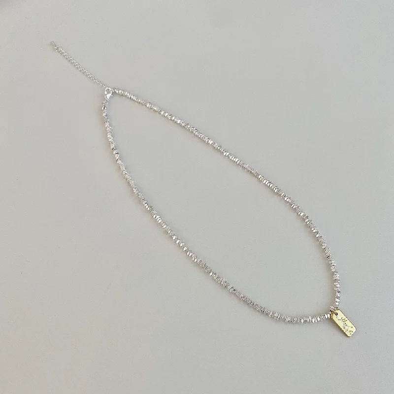 Small Pieces of Silver Small Hangtag Necklace